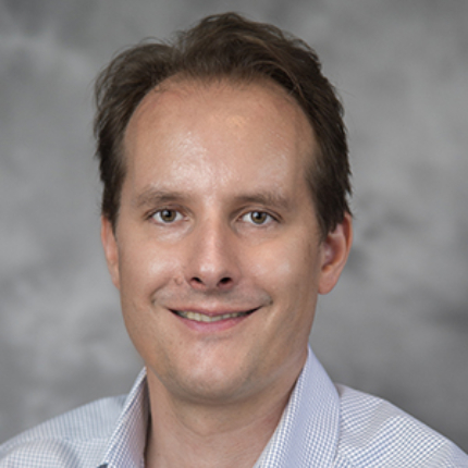 headshot of David Gill