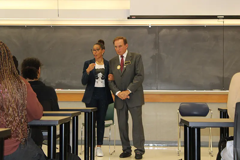 Executive speaker in classroom