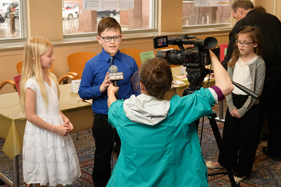 Elementary student speaking to camera