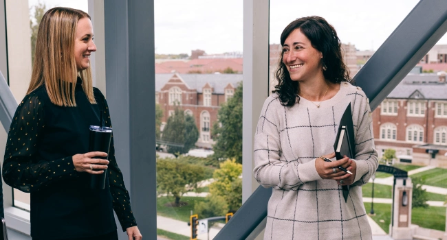 two researchers in conversation