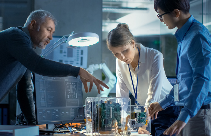 Workers collaborating on a project