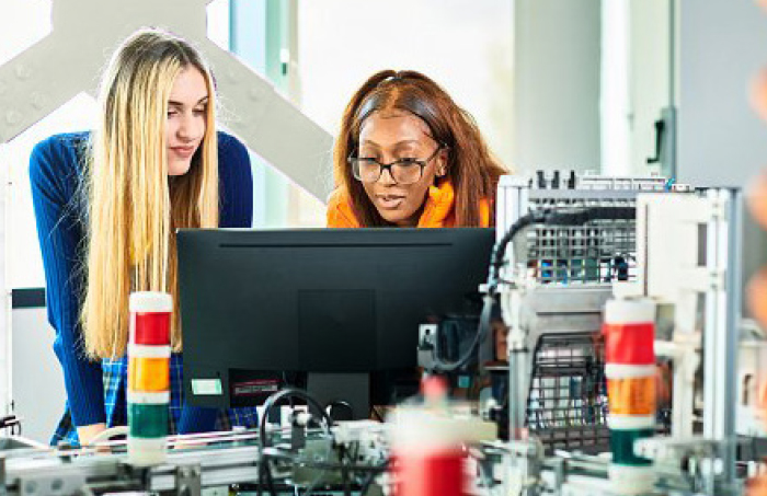 Two coworkers in a lab working