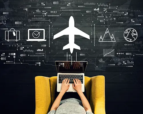 Stock image visualizing a woman buying a flight online