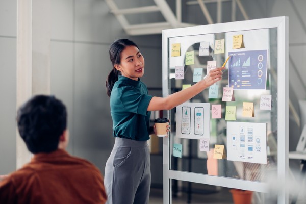 A woman gives a presentation