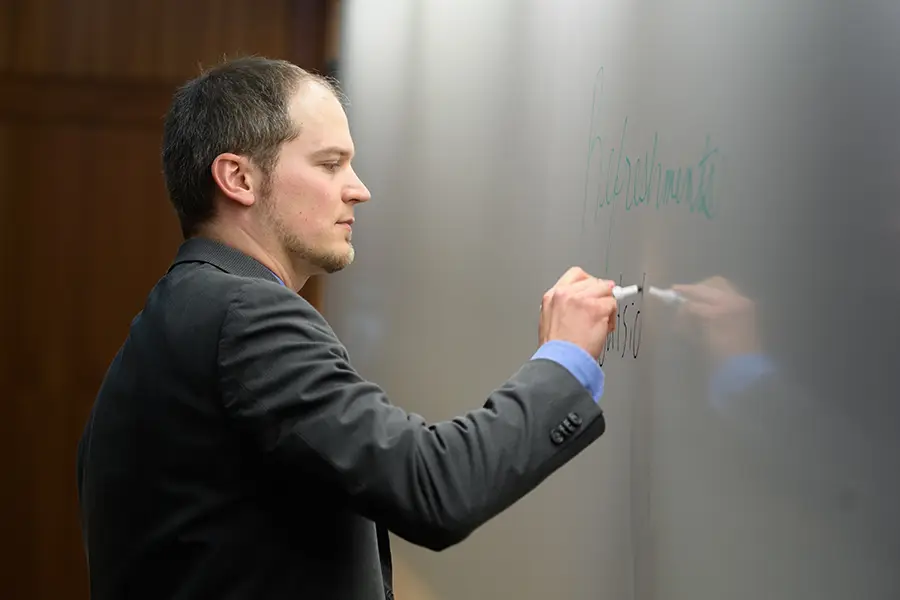 Professor at whiteboard