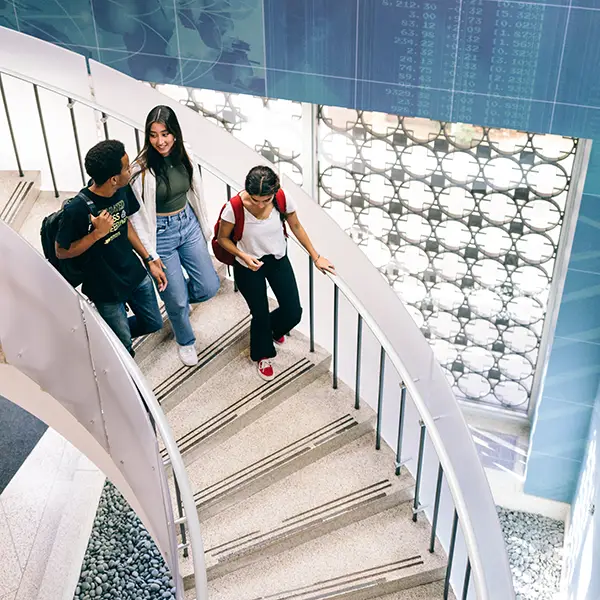 High schoolers explore the Parrish Library at the Daniels School of Business